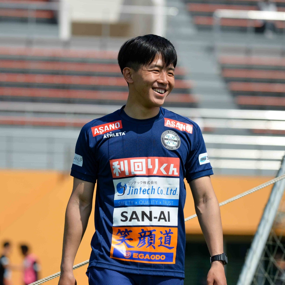 競技場に立つ高橋功大さん